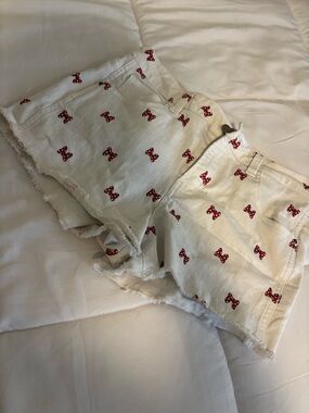 Disney White Denim Shorts with Red Bow Print